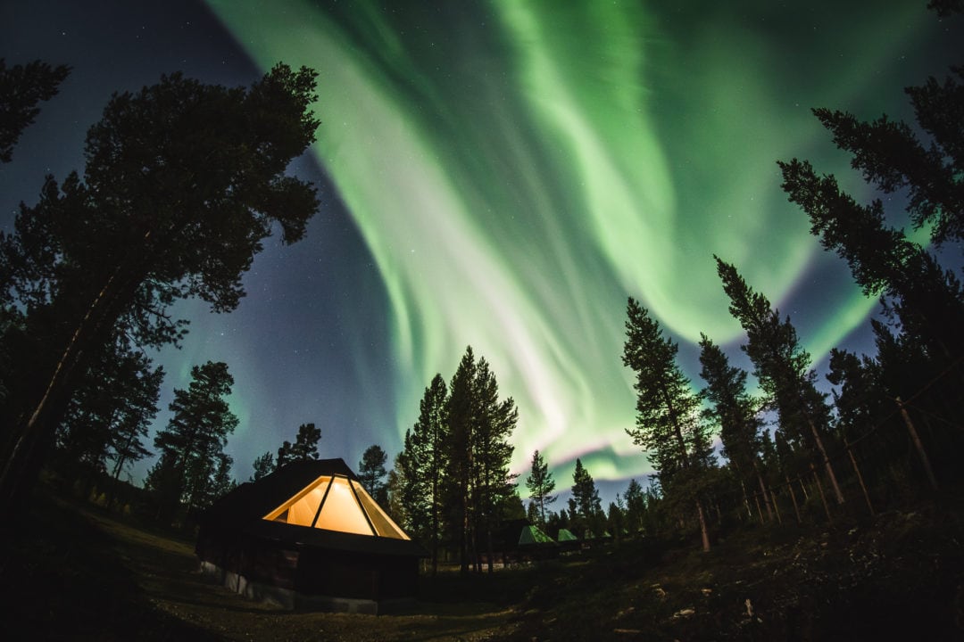Aurora Village hotel in Ivalo Lapland Finland offers amazing northern lights experiences. Photo by Alexander Kuznetsov.
