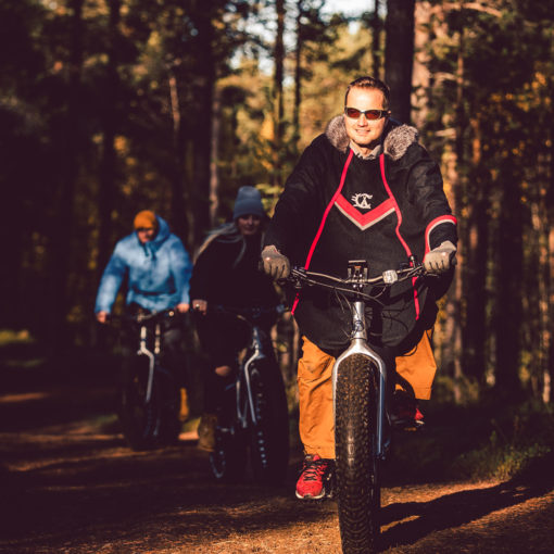 Juha Tuunanen leading mountain biking tour at Aurora Village Ivalo Lapland Finland.