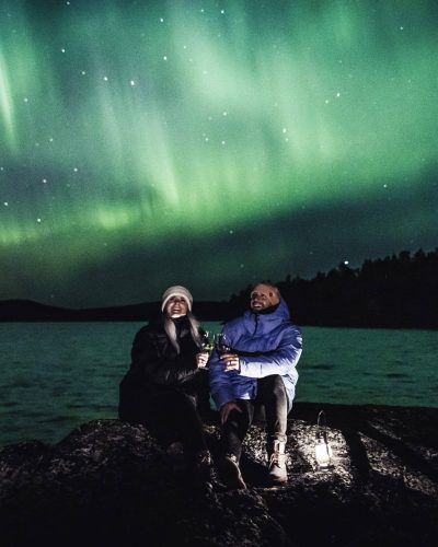 Our firiends Mattia and Heini watching Aurora Borealis in Ivalo Lapland Finland.